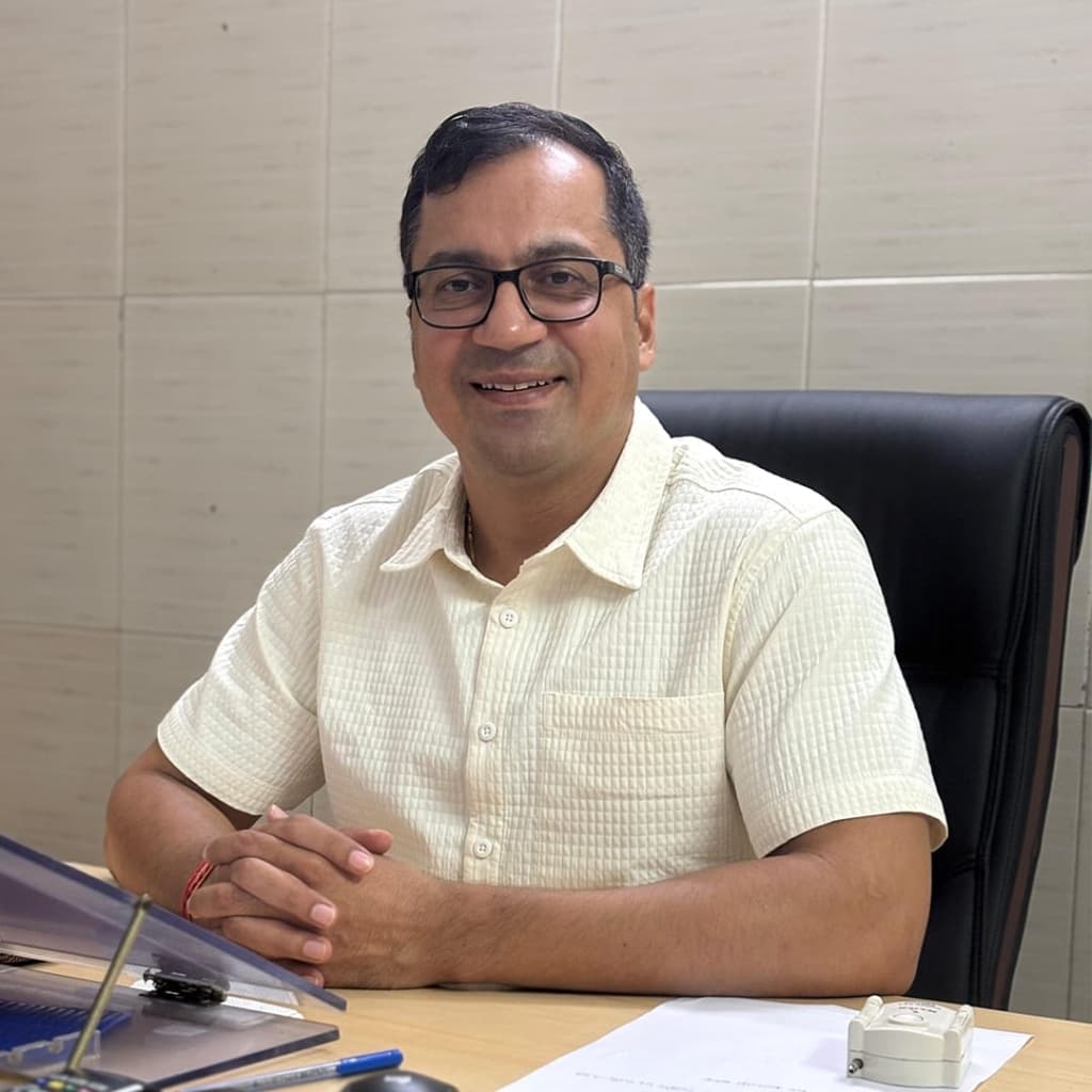 Dr. Vineet